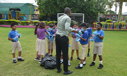 Students engaging in a classroom discussion with a teacher